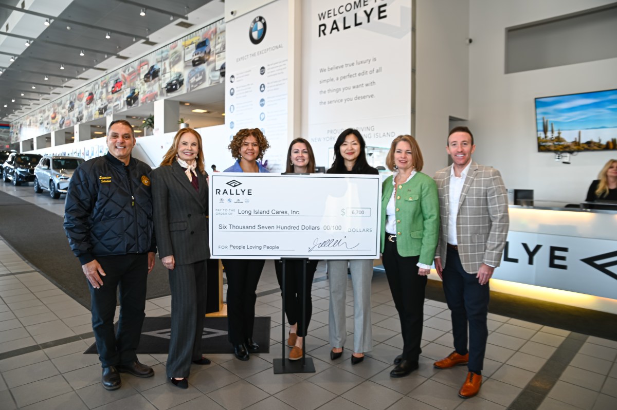 Rallye Motors donated $6,700 and a van full of food to Long Island Cares and People Loving People to help hungry families across Long Island.