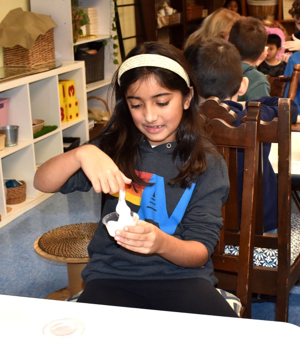 Glenwood Landing students playing with slime.
