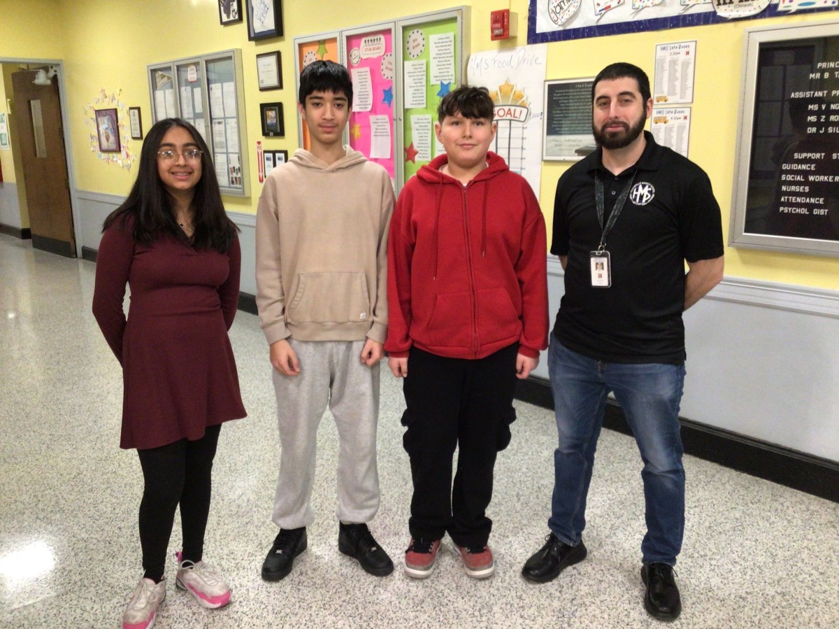 Connect Four champions Aadhya Patel, Mansoor Azimi, Carlos Nunez and Mr. Josh Morrow (L. to R.) from the Hicksville Middle School's competitions.