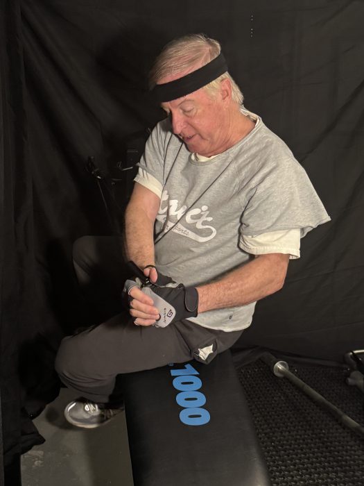 Raymond Soletic using a strength training machine