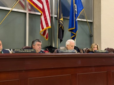 The Glen Cove City Council approved an environmental report for a proposed mixed-use affordable housing development despite concerns.