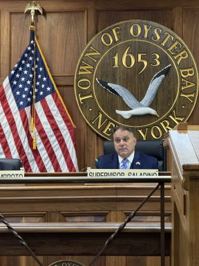 Oyster Bay Town Supervisor Joseph Saladino and the town board held a public hearing about traffic law changes.