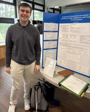Paul D. Schreiber High School 2026 Top 300 Regeneron Scholar Benjamin Moses with his project.