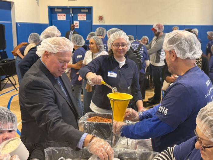 Nassau County Legislator Deputy Minority Leader Arnold Drucker took part in the meal-packing effort. 