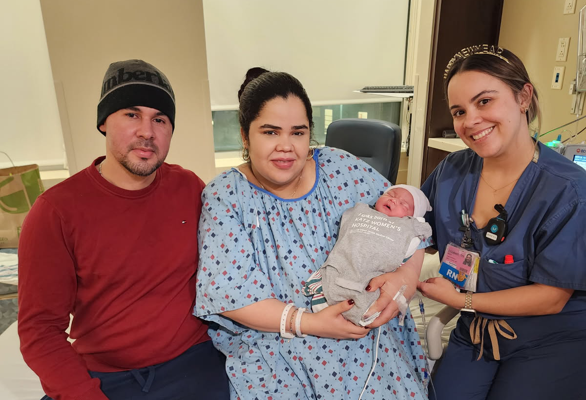 Ana Elena Gutierrez-Tavares, Luis Gutierrez, Mateo Gutierrez, and Ana's cousin Elizabeth Marin, (L. to R.), who was on the team that delivered her baby.