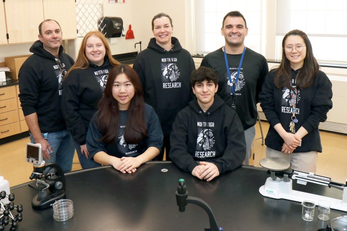 Sophia Li and Kian Daniel Soleymani from John L. Miller Great Neck North High School with educators.