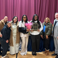 Milan Rizo (center) receiving the Dr. William A. Shine Student Awards