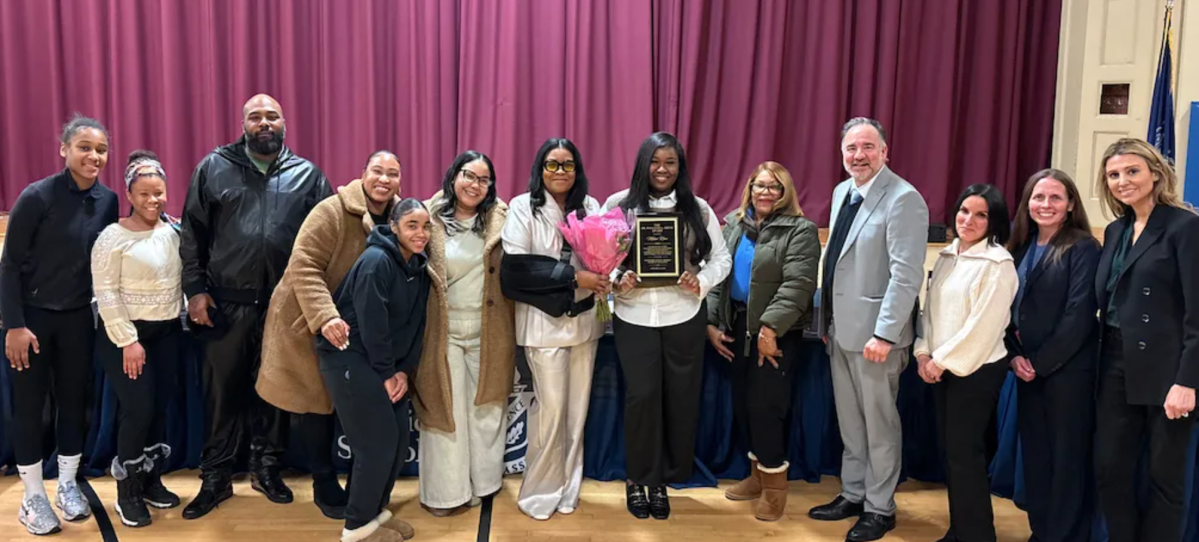 Milan Rizo (center) receiving the Dr. William A. Shine Student Awards