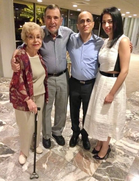 <span class="image-caption">Screenshot</span>Marian and Bill Dobkin (L.) with Raymond and Ania Iryami (Florida 2015). Photo provided by Raymond Iryami.