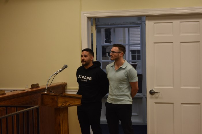 Strong Pilates owners addressing the village trustees.