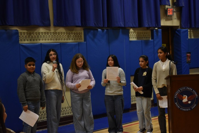 Garden City Park School student council speaking about the school’s centennial celebration.