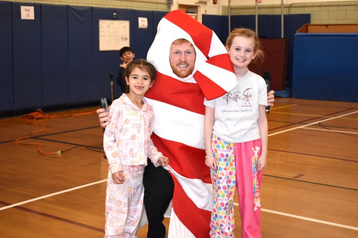 Glen Head School principal Thomas Sheehan with students.