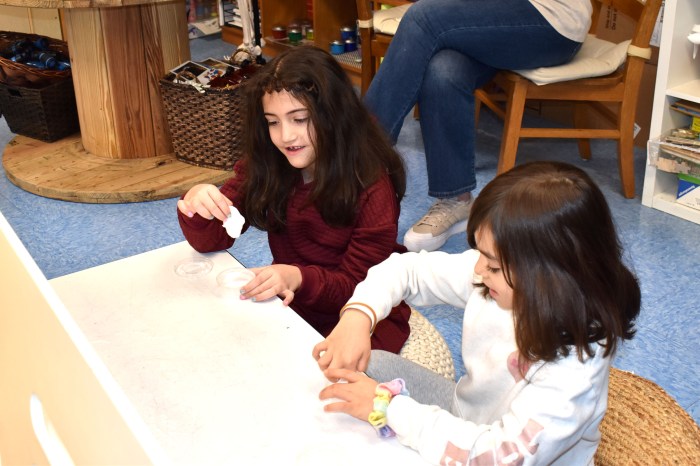 Students playing with slime.