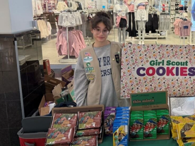Dahlia C, local Girl Scout from Roslyn Heights selling cookies.