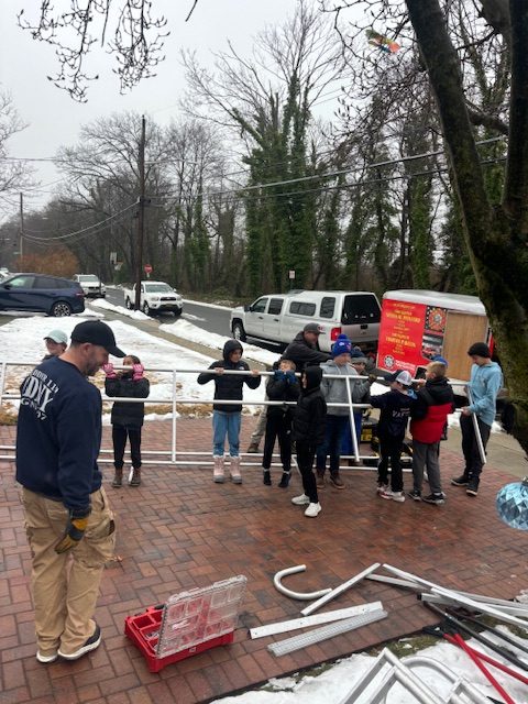 The Pequa Ballers from Massapequa helped build the ramp. 