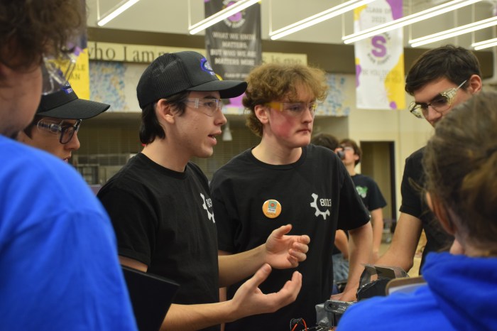 Members of Kuiper, Nicholas Vebeliunas and Henry Brown explained the process of building their robot to the FIRST judges.