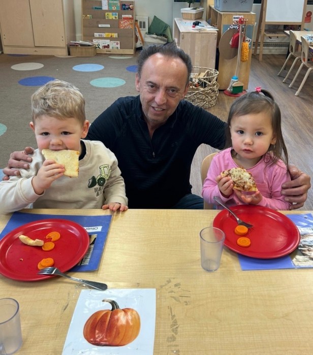 Port Washington Children's Center students with Toscanini owner Freddie Sadiku.