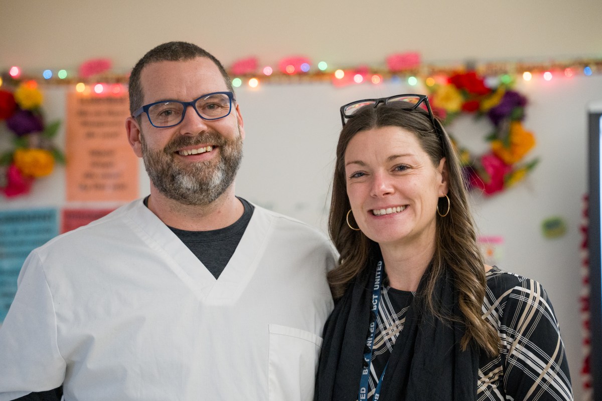ICT and wound specialist Gerry Connelly (L.), who is the brother of BHS Spanish teacher Kathryn Oak (R.), shared stories from his daily work with Spanish-speaking patients.