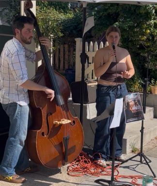 Organizer Will Winchester (L.) performing in front of the Sea Cliff Daily Grind, one of the venues set to host jazz in the upcoming Sea Cliff Jazz Festival.