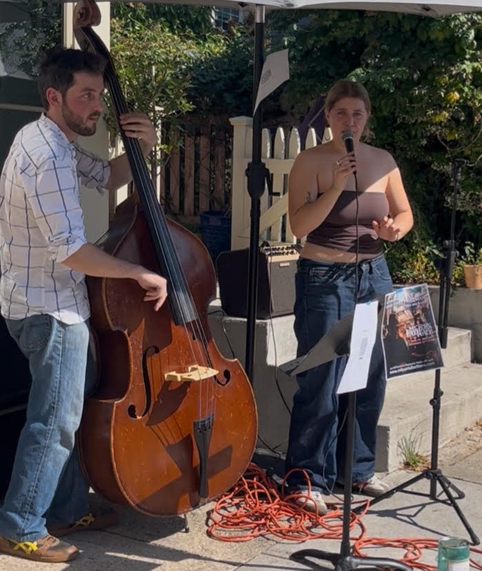 Organizer Will Winchester (L.) performing in front of the Sea Cliff Daily Grind, one of the venues set to host jazz in the upcoming Sea Cliff Jazz Festival.