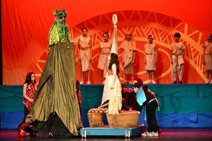 Students sand and danced with beautiful sets and costumes.