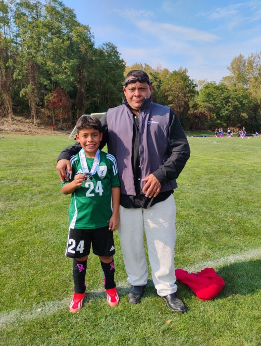 Tomas Orellana (R.) with his son Tony Orellana (L.)
