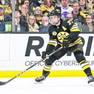 Boston Bruins defenseman Charlie McAvoy is one of the Long Island athletes set to compete in the 2026 Winter Olympics in Cortina, Italy.