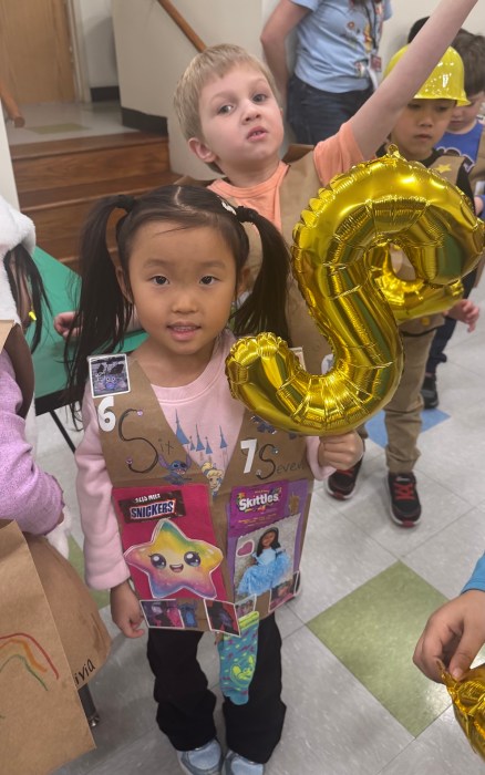 Kindergarten students participated in a parade to celebrate learning.