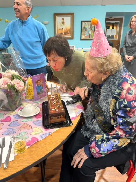 Anna Caraccio blew out her birthday candles. 