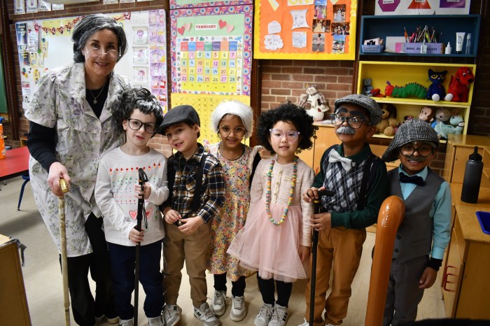Elementary kids in costumes for 100 day.