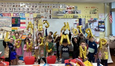 Meadow Drive kindergartners show off their creative letter costumes as they prepare for their celebratory alphabet parade.
