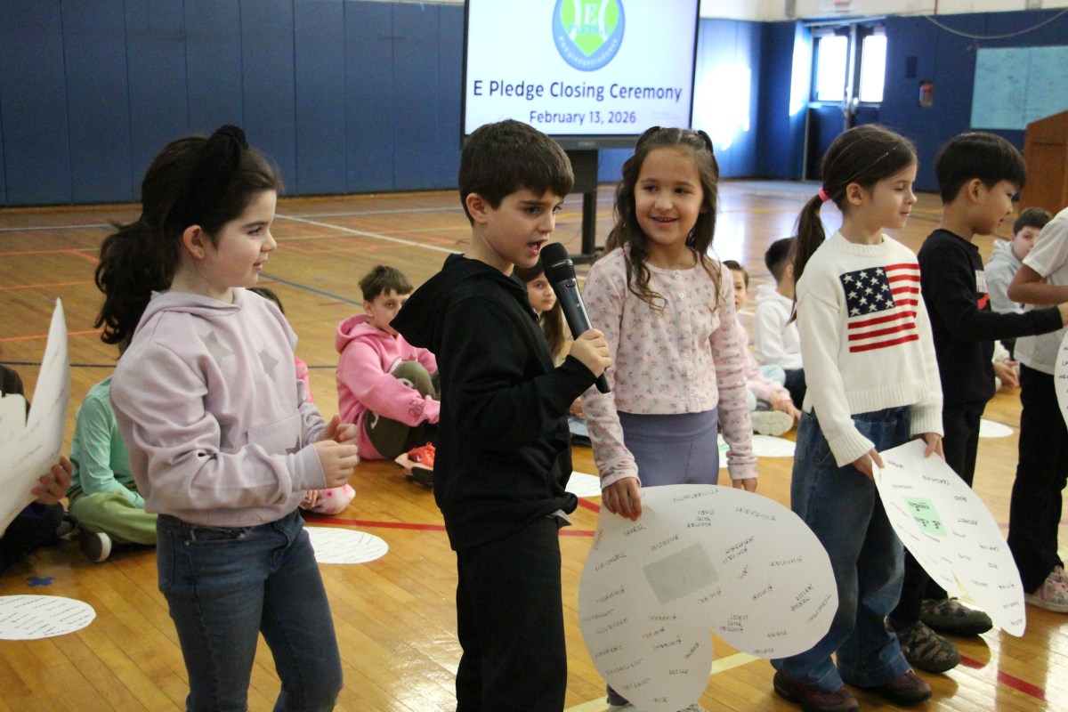 Harbor Hill students read aloud words of kindness for the annual E-Pledge Kindness Project.