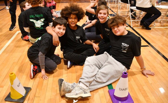 Bayville students Daniel Infante, Art Wouansi, Everett Carfora and Parker Merten (L. to R.) celebrated after a successful show.