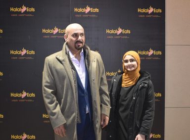 Jimmy Amad, (L.) with his daughter at the grand opening celebration for Halal Grill Eats.