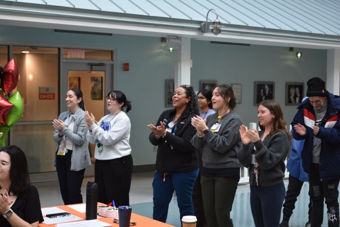 Workers from the hospital gathered to watch and enjoy the performance.