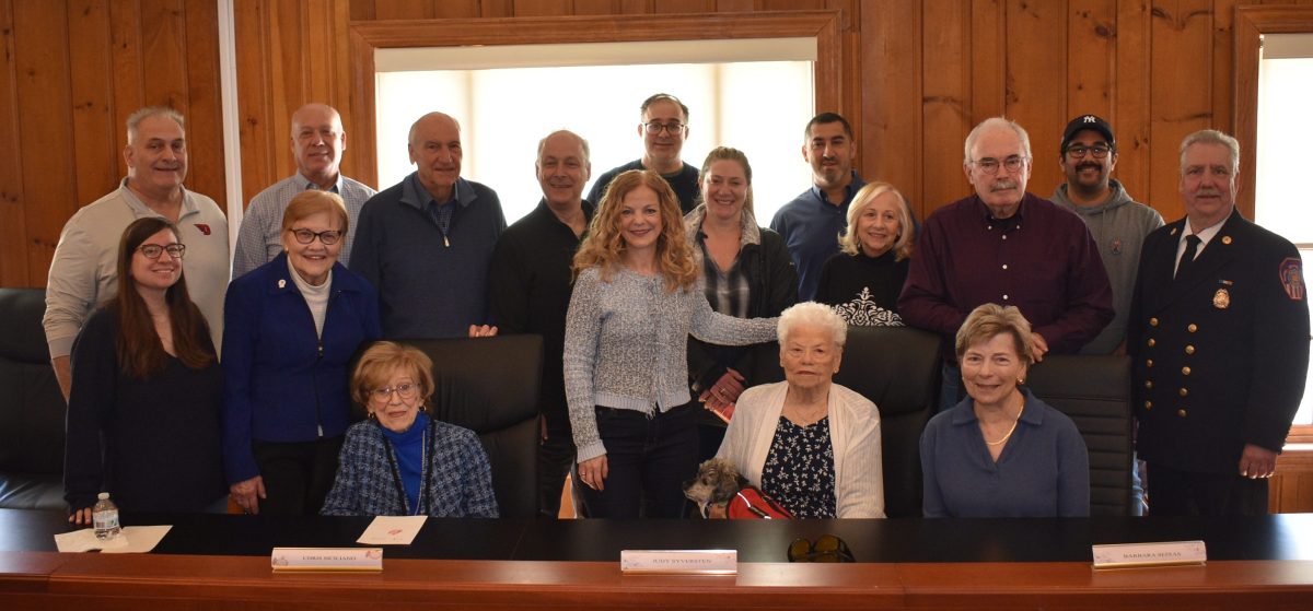 Historic committee members and village officials, including Mayor Bonnie Parente (Center) and County Legislator Scott Strauss (L.) at the breakfast celebration.
