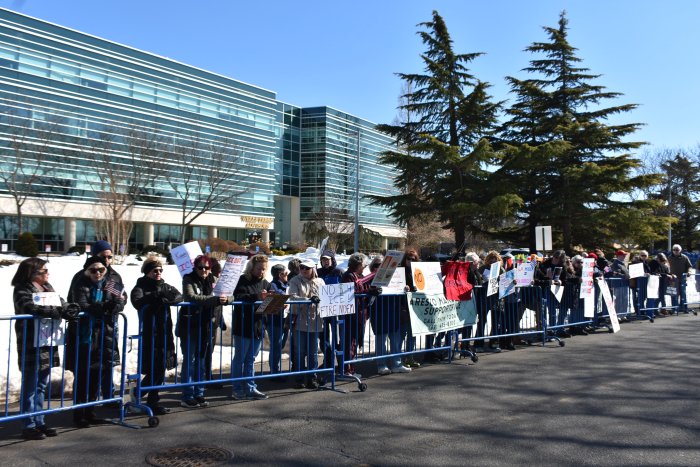 Protestors demanded Nassau County stop cooperating with ICE.
