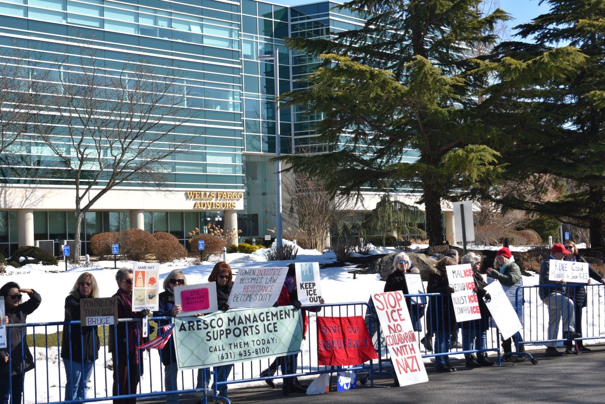 Protestors gathered outside of a Woodbury office building, where ICE is renting offices for 40 attorneys.