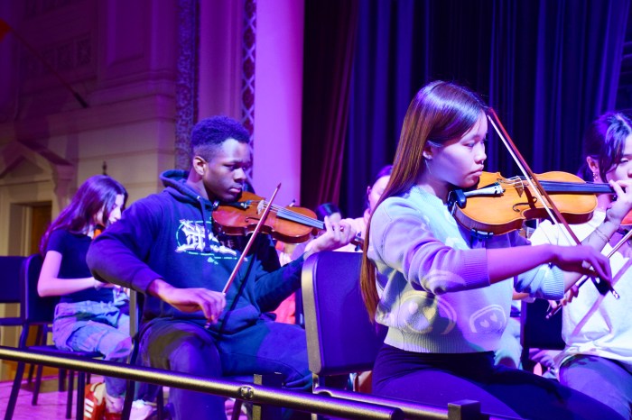 Students shared orchestral talents with school community members.