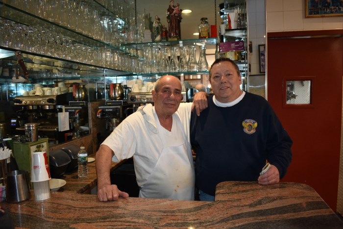 Frank Speciale (L.) with a longterm Gino's Pizza customer Eddie Savage, (R.).