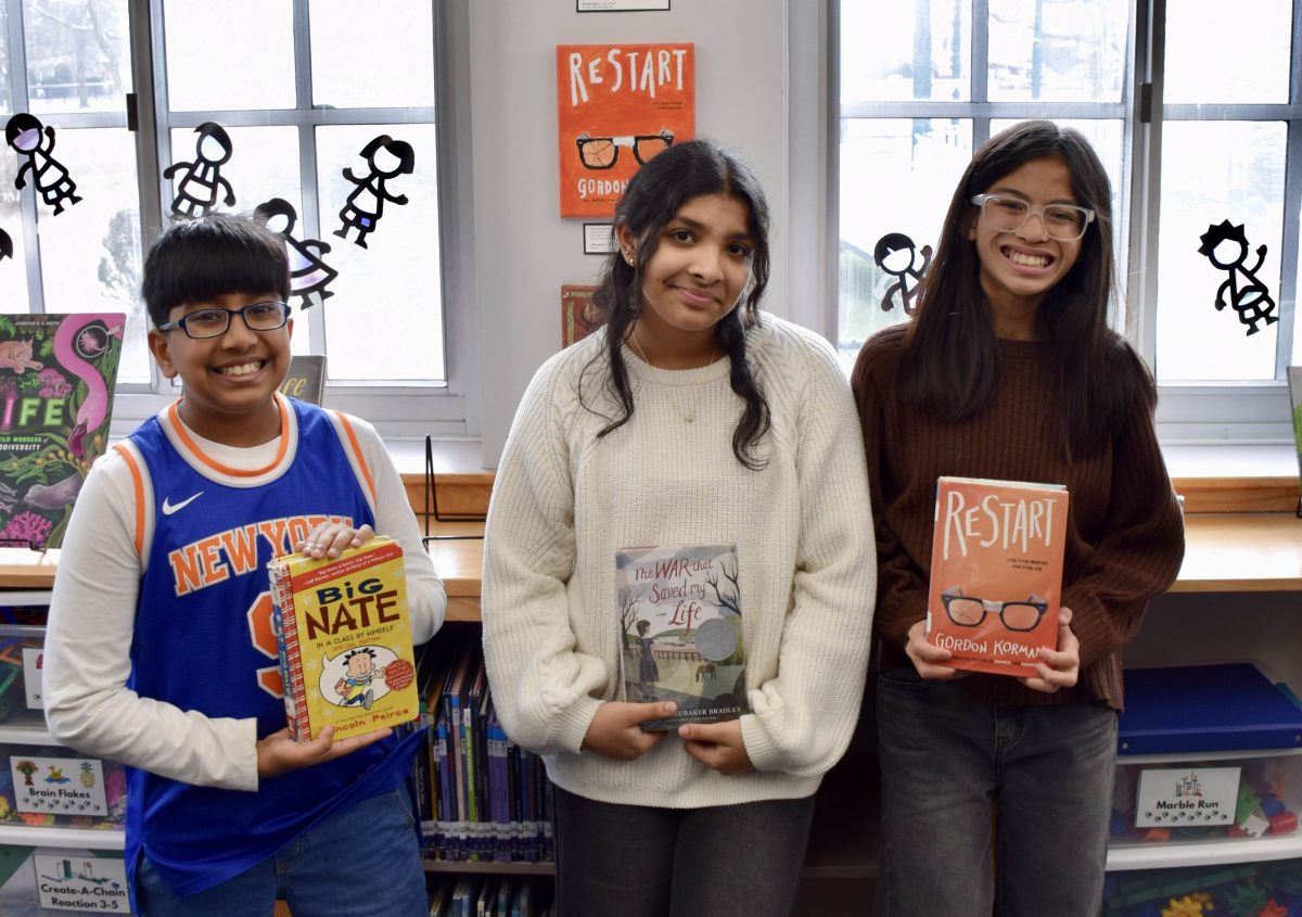 Hillside Grade School sixth graders are pictured with their library legacy projects.