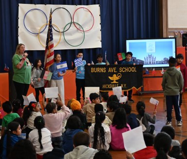 In celebration of the 2026 Winter Olympics, students at Burns Avenue Elementary School in Hicksville held a schoolwide Olympic opening ceremony