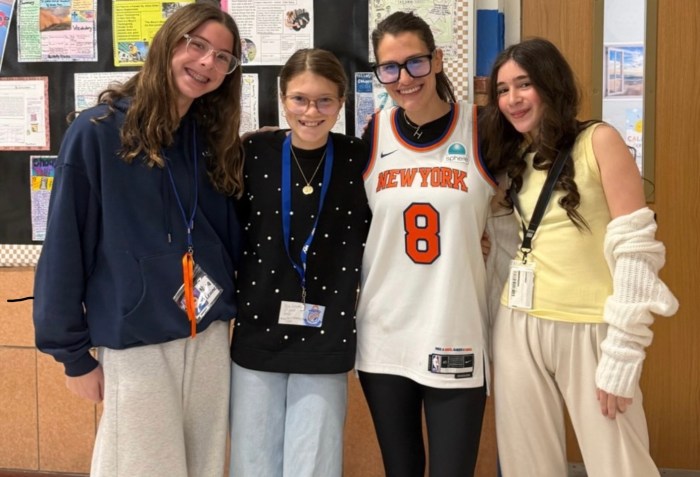 Manhasset students and a teacher on role-reversal day