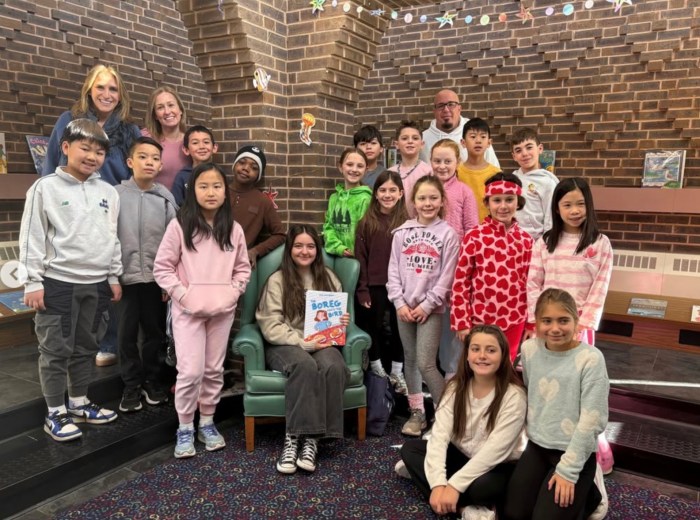 Sofia Ogulluk with Shelter Rock elementary students.