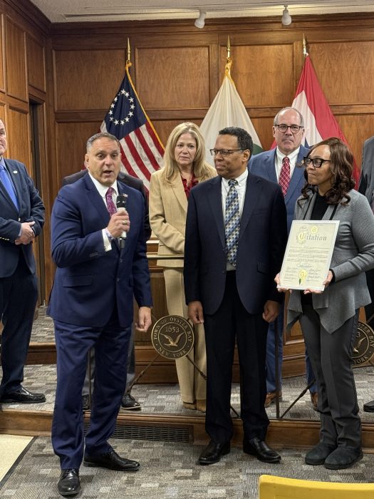 Oyster Bay Town Supervisor Joseph Saladino (L.) said he and the town board are proud of the work done by Robert Brown (2nd from R.) and Carol Brown (R.).