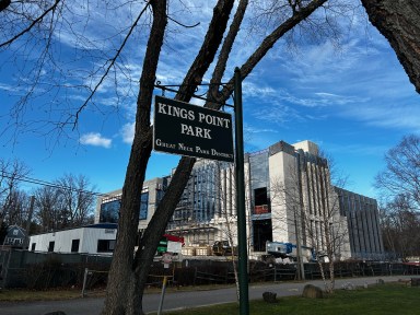 Kings Point Park entrance on Steamboat Road with the United Mashadi Jewish Community of America center under construction in the background