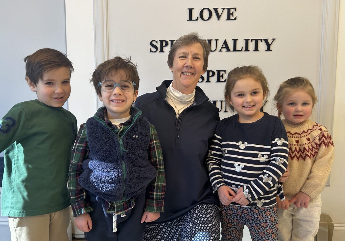 Principal Sister Kelly Quinn (C.) with some students at Our Lady of Grace