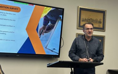 Architect John Grillo presenting the building condition survey at Manhasset Board of Education meeting