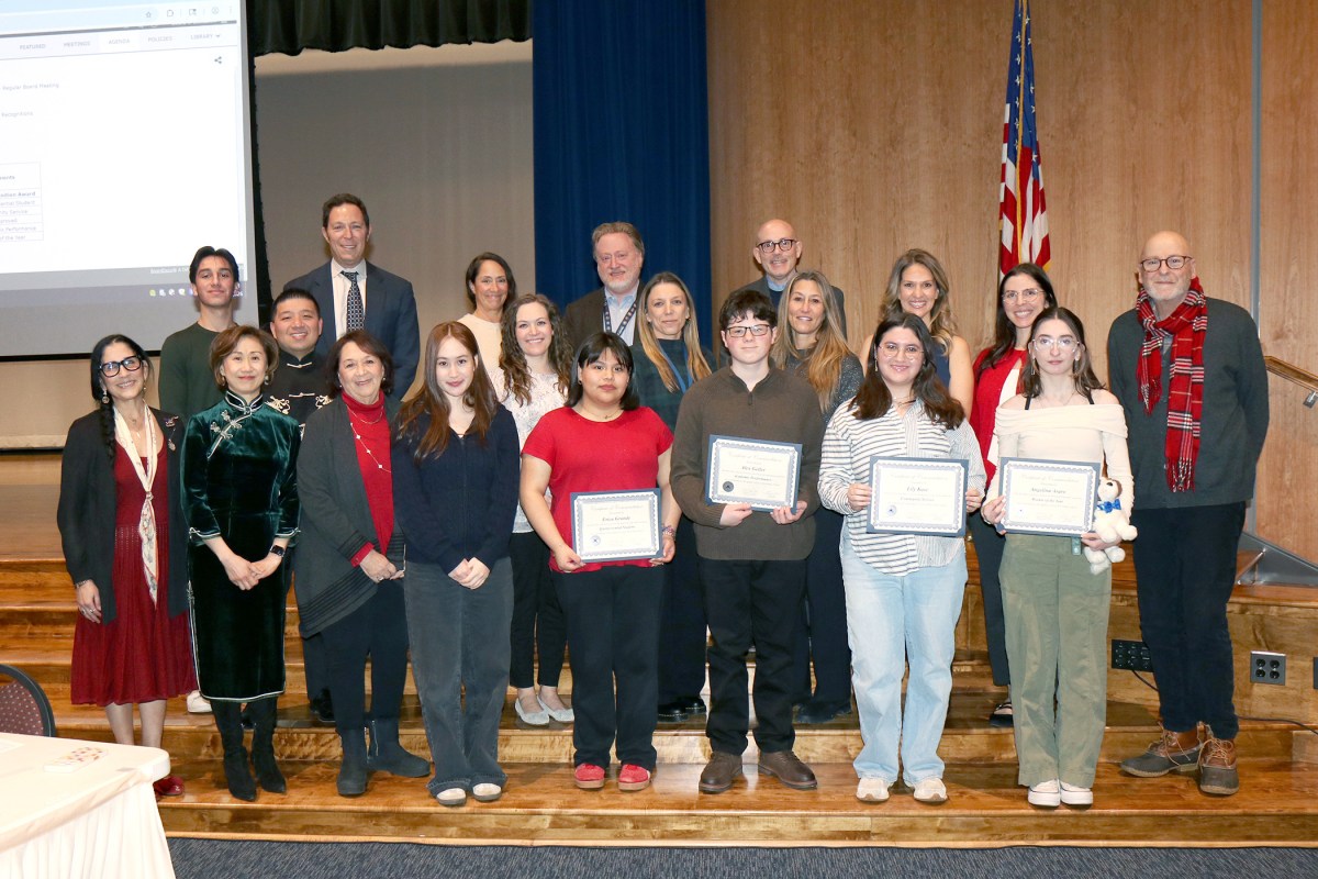 Village School students being recognized by the Great Neck Board of Education