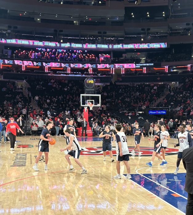 Manhasset Unified basketball players during the halftime game